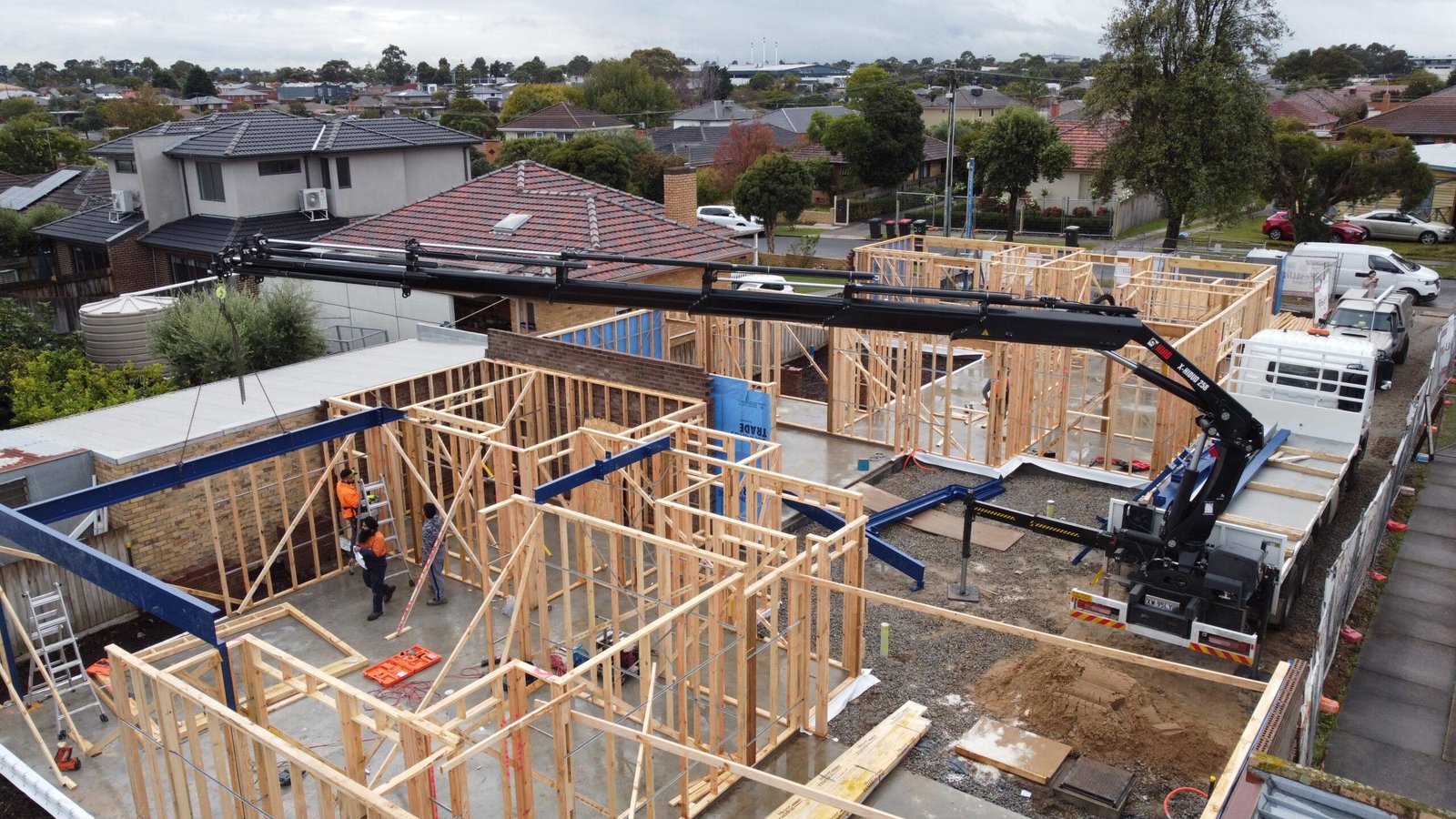 M10 Truss prefab timber frames going up — aerial drone view, Pakenham VIC